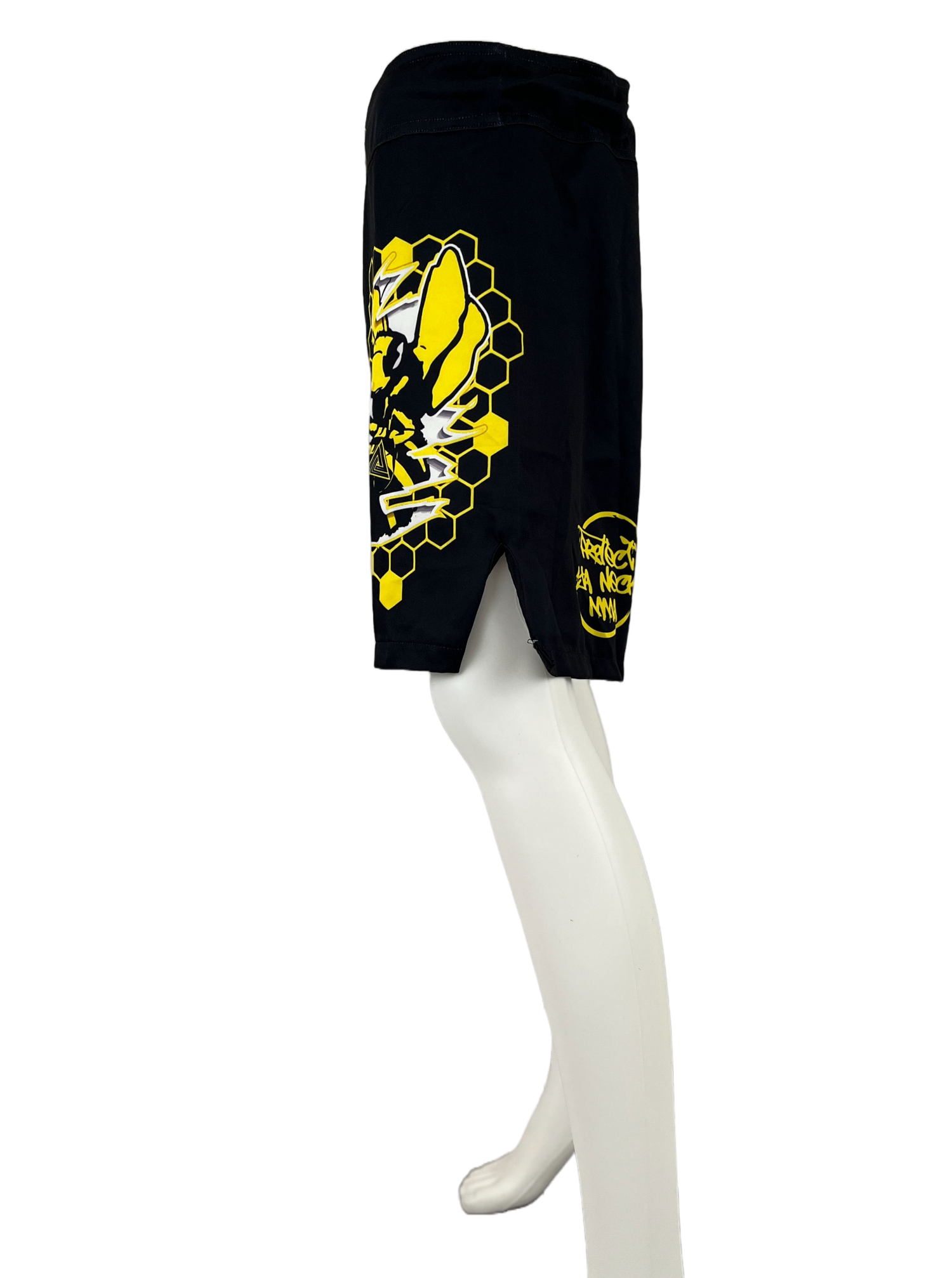 black and yellow loose fit mma shorts for grappling killa bees worldwide killa bee ripping through honeycomb left leg protect ya neck mma back left left side profile